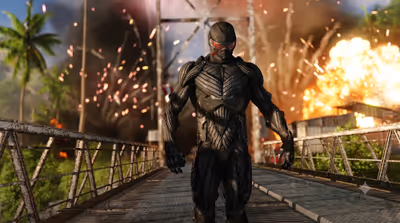 A soldier in a black Crysis Nanosuit walking on a bridge with an explosion in the background