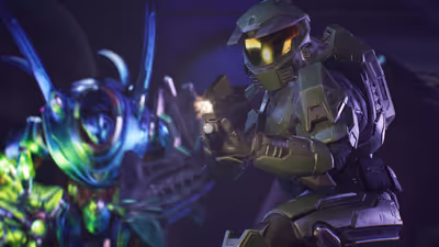 Master Chief aiming a pistol with a flashlight at a large, armored Covenant Hunter in a dark, purple-lit corridor.