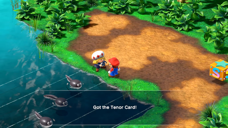 Mario receiving the Tenor Card from the composer Toadofsky at Melody Bay in the Super Mario RPG remake.